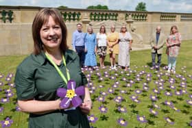 Chief executive of Ashgate Hospicecare Barbara-Anne Walker has officially opened the charity's Forget-Me-Not display at Chatsworth House.