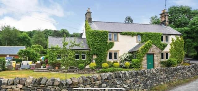 The four-bedroom semi-detached house on Hockley Lane, Milltown, Ashover, is on the market for £525,000.
