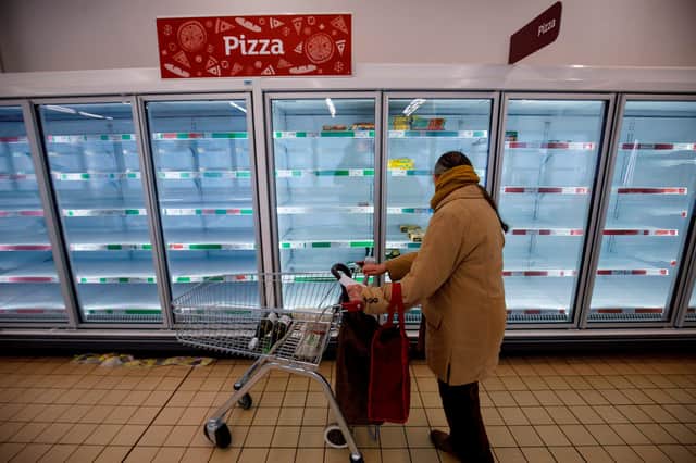 Some shoppers have been panic buying again in the build up to lockdown. Picture: Getty. (Photo by TOLGA AKMEN/AFP via Getty Images)