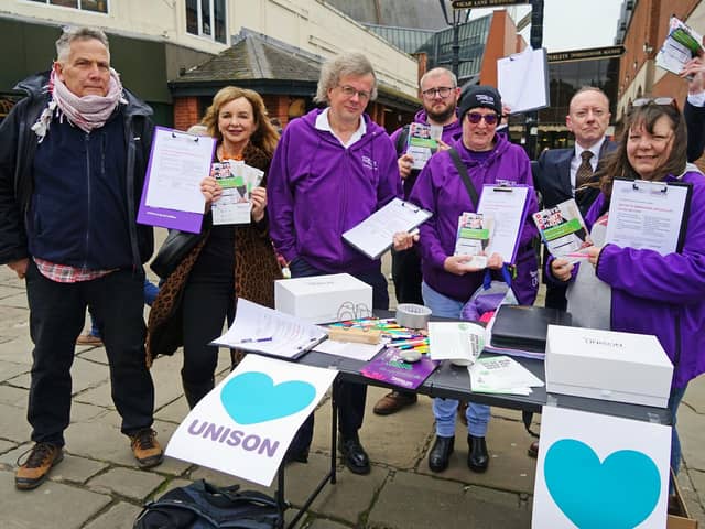 Unison  is launching a campaignto fight cuts at Derbyshire county Council. Seen with petitions on Low Pavements Chesterfield.