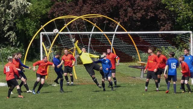 Action from Newbold Community FT Youth's 4-1 win over Grassmoor Sports Res in Division 6. Pic by Martin Roberts.