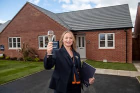 Sales advisor Molly outside the Tunstall  view home, which is open at Bellway’s Hatton Court development in Hatton