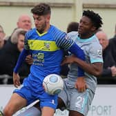 George Carline in action for Solihull Moors against Devante Rodney of Hartlepool United.