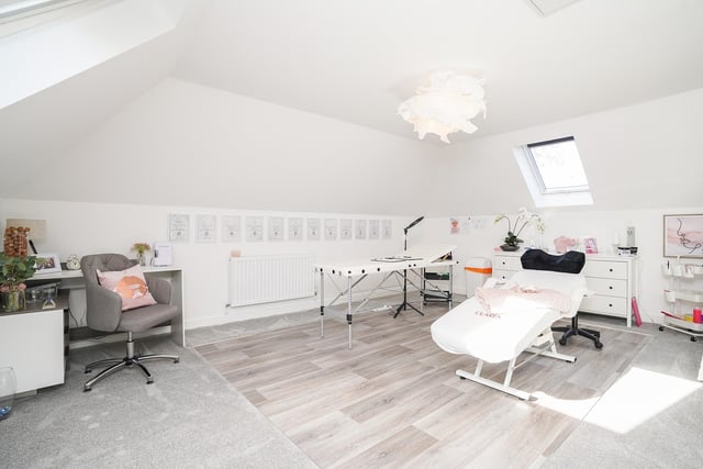 The second floor is a great space that offers many possibilities.  It's currently used as the base for a home business and would also make a great bedroom for a family with a teenager looking for their own space