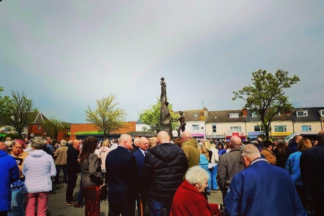 Hundreds of residents and supporters gathered in the market place to support the unveiling.