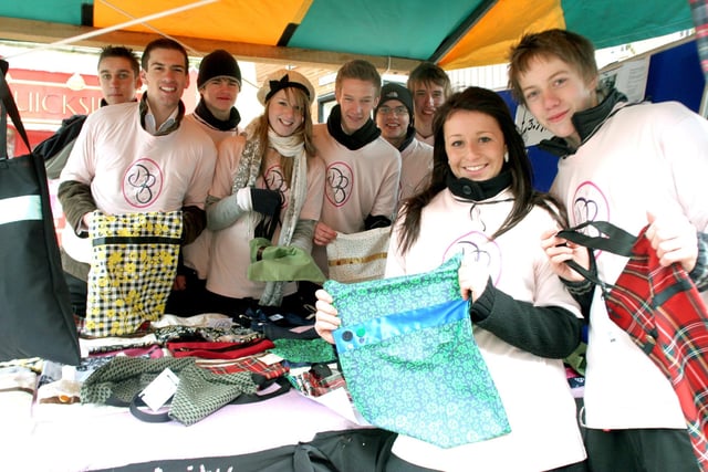 Pupils from Brookfield Community School's 'Company One' selling Dollie bags as part of the Young Emtreprise event in 2007. Pictured are the team with Hannah Bagnall and Ben Barnes in the front.