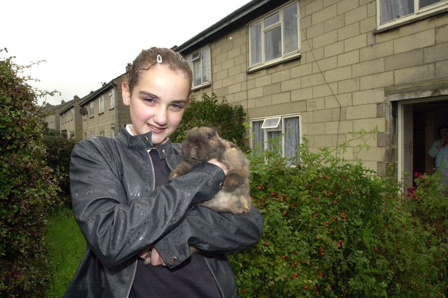 13-year-old Becky Racz and her rabbit Sandy. Becky of Kingsway, Mapplewell noticed their neighbours house on fire when she went to bring Sandy in from the garden.