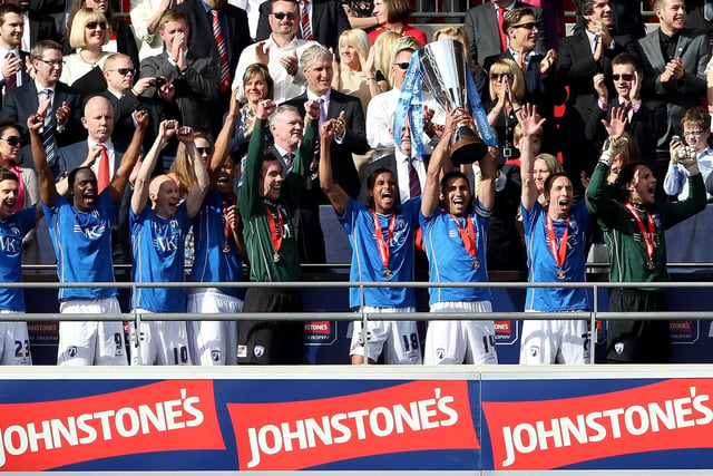 The Chesterfield team celebrate winning the Johnstone's Paint Trophy Final against Swindon Town on March 25, 2012.