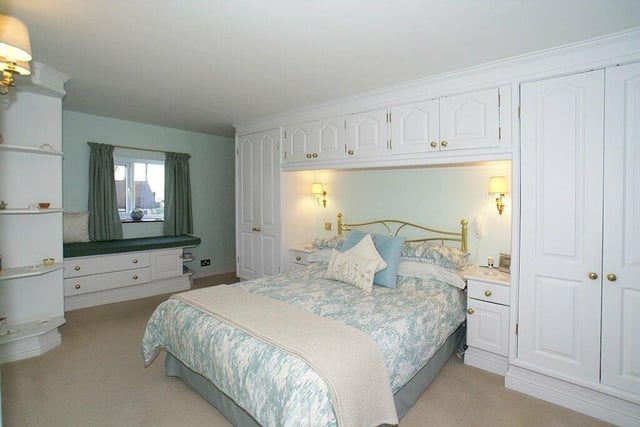 The principal bedroom offers built-in cupboards with hanging and shelves for clothes and shoes.