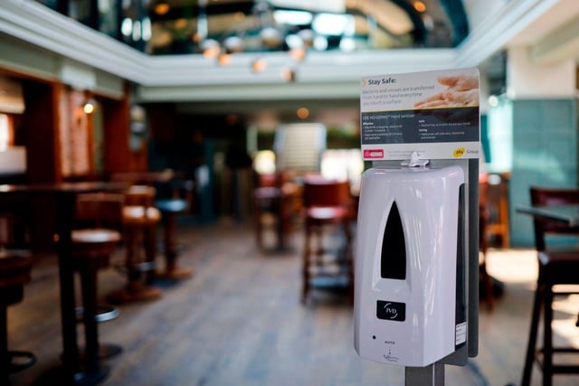 Hand sanitiser points will be in place throughout the pubs.There will be at least ten in each pub, for staff and customer use. (Photo by TOLGA AKMEN/AFP via Getty Images)
