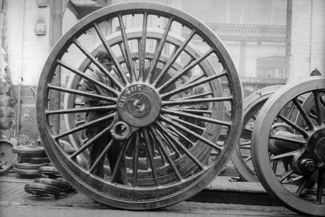 Locomotive wheels at the London Midland and Scottish Railway works in Chapel on le Frith in 1934.  (Photo by Fox Photos/Getty Images)