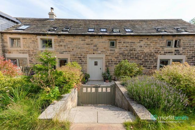 This three bedroom barn conversion is modern throughout with countryside views. Marketed by Morfitt Smith, 0114 488 9795.