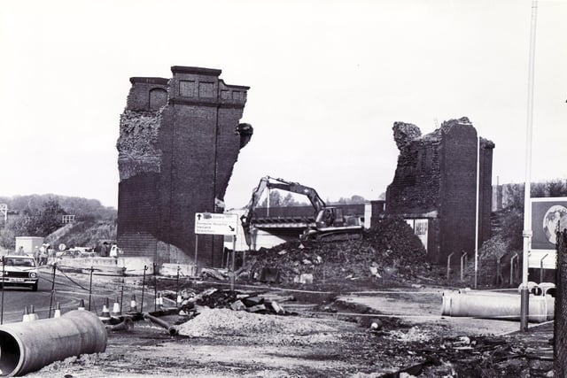Demolition work is carried out on the old Horns Railway Bridge, Chesterfield, once part of a railway viaduct which stradded the main Derby Road, is seen here being removed to make way for the new by-pass in 1984