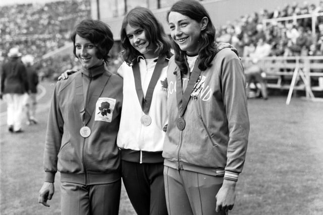Scottish long jumper Moira Walls (right) shows off her bronze medal.