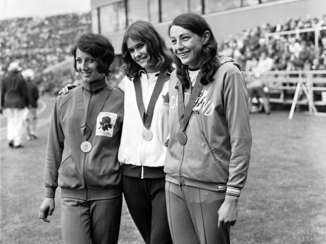 Scottish long jumper Moira Walls (right) shows off her bronze medal.