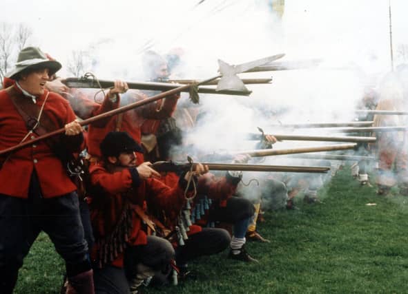 English Civil War event at Portchester Castle October 7-8, 2006. The News PP3903