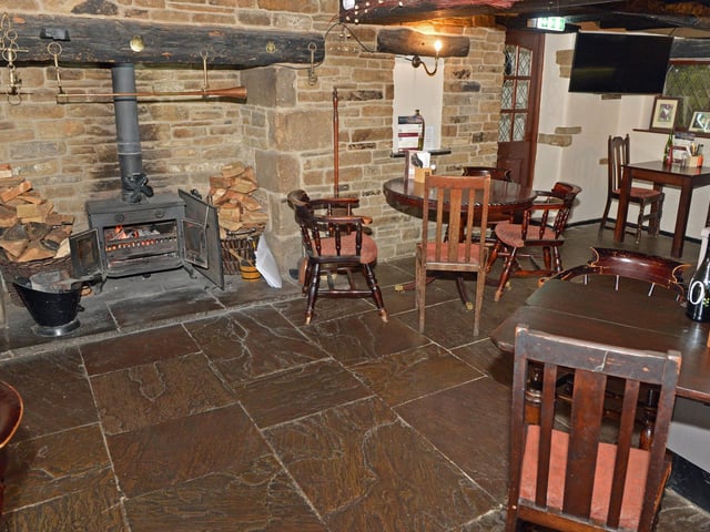 The inn was established at the top of Pudding Pie Hill, which sits on the old Chesterfield to Baslow road, over 600 years ago. The building was presented to the monks of Beauchief Abbey in a license granted by Richard II in 1392.