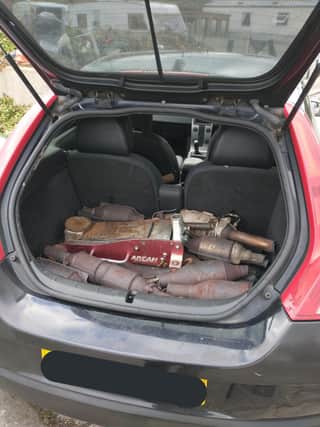 At least 12 catalytic converters were found in the volvo - five of which were stolen from Derbyshire yesterday (picture: Derbyshire RPU)