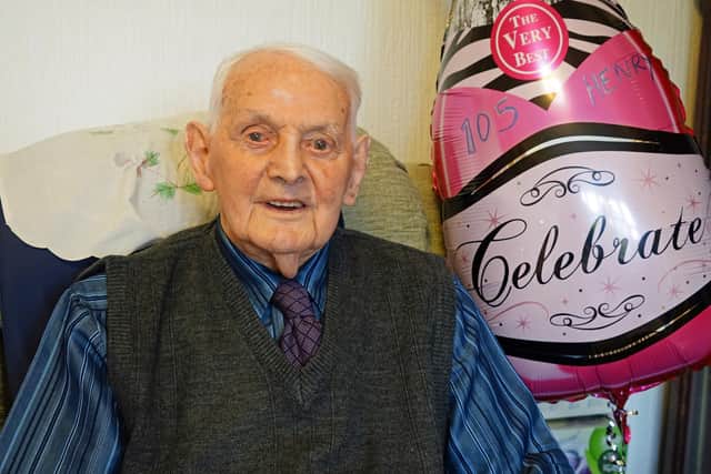 Henry Holmes is 105 years old.