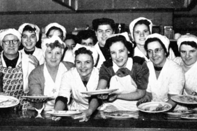 Canteen staff serving workers at Trebor Bassett. Do you recognise anyone on the photo or know what year the photo was taken?