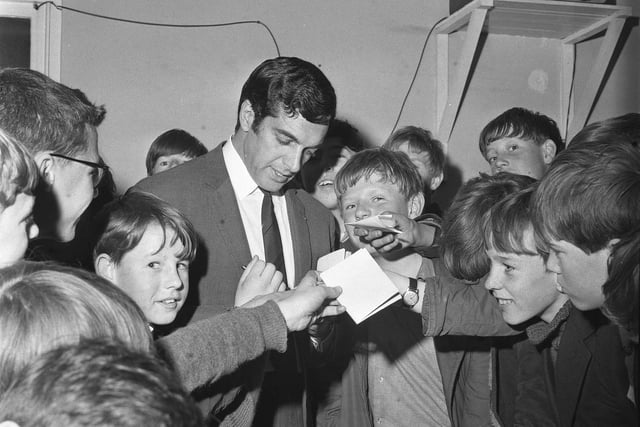 Singer Frankie Vaughan pictured signing autographs during a visit to Hartlepool Boys Welfare Club. Were you there?
