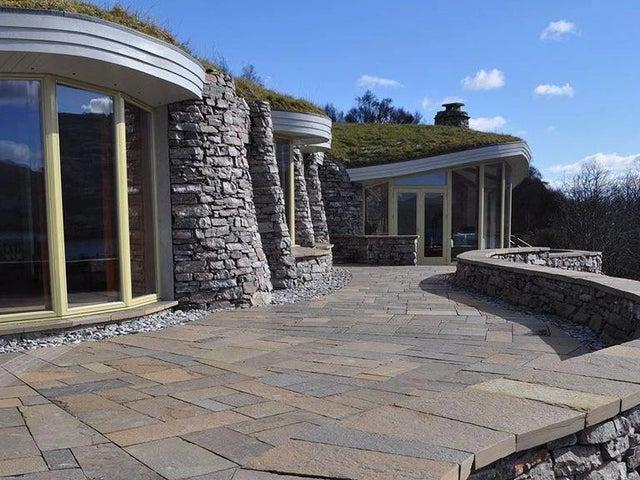 Nestled into a hillside above Ullapool, these two luxurious retreats are sculpted from stone, turf and glass to provide a unique place to stay, boasting stunning panoramic views across Loch Broom and the Summer Isles. Book: https://bit.ly/33pCe8o