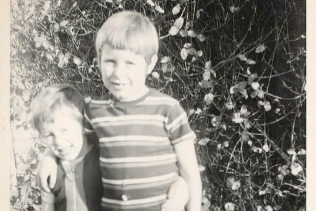 Brian aged 10, right, with Craig aged four or five, at their childhood home in Basildon