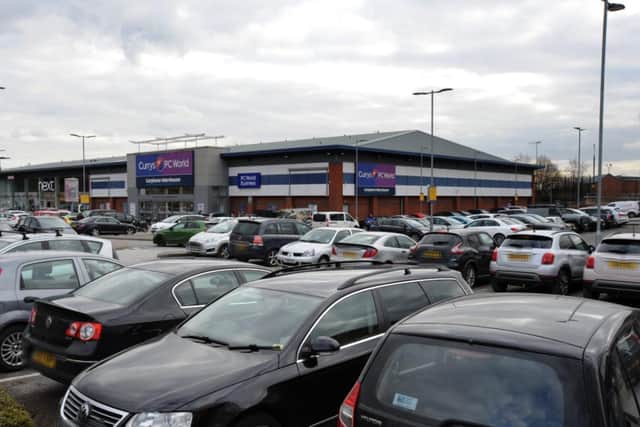 Cars parked at Ravenside Retail Park in Chesterfield.