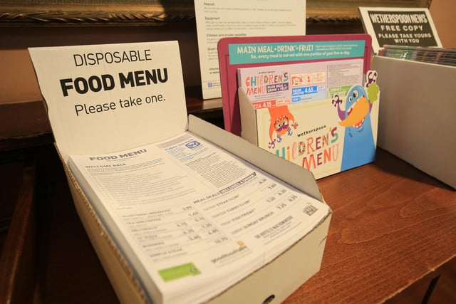 Disposable menus will be used to limit the number of people who touch each one. Picture: Chris Etchells