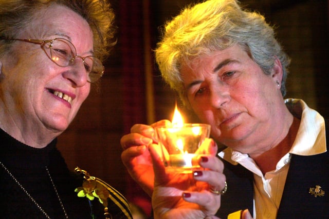 Holocaust memorial day, ceremony of remembrance, reception rooms, Sheffield Town Hall. The Lord Mayor of Sheffield councillor Marjorie Barker and leader of the council Jan Wilson lit their candles in 2003