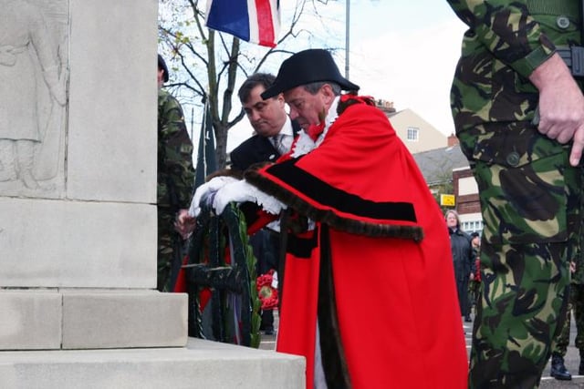 Chair of Council, Cllr Tony Sockett laying a poppy wreath at the Bennetthorpe service in 2007.