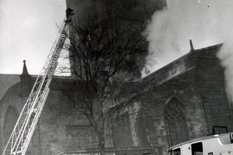 Firefighters tackle the blaze at Chesterfield's Crooked Spire in 1961.