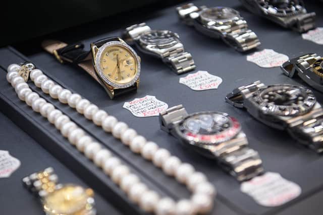 A diamond-encrusted Rolex watch is seen in a store window in the financial district, also known as the Square Mile, on January 20, 2017 in London, England. (Photo by Leon Neal/Getty Images)