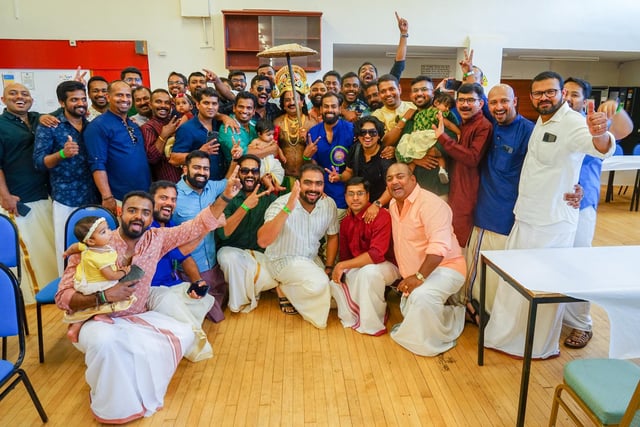 The male members of the Malayali community posing for pictures with Mahabali