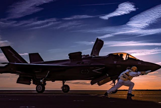 An F-35B Lightning jet sits on HMS Queen Elizabeth's flight deck during her Westlant 19 deployment to the east coast of the USA. This image was part of the winning selection by Photographer of the Year Leading Photographer Kyle Heller. It also won the Maritime Air Prize.
