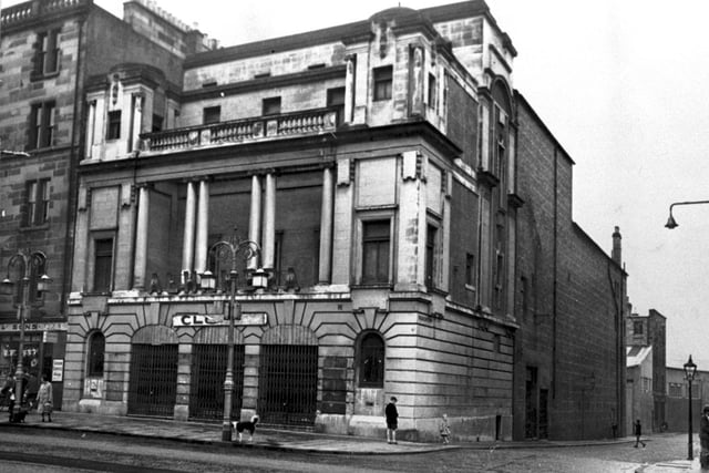 The former Alhambra cinema at the Foot of Leith Walk, taken around 1959. The Alhambra Theatre was opened in 1914 as a ‘Theatre of Varieties’, with seats for 1,550 people. In March 1915 it began playing cine-variety programmes. The cinema screened its first ‘talkie’ “Two Weeks Off” starring Dorothy Macall and Jack Millhall on 5th August 1929. It closed in 1958, and the building was boarded up, before eventually being demolished in 1974.