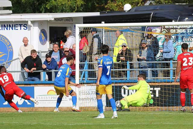 Kabongo Tshimanga scores his second goal in the win against King's Lynn. Picture: Alan Palmer.