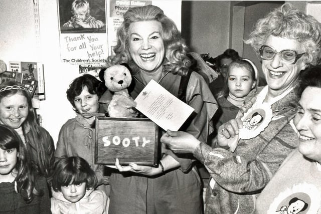 Retro Derbyshire. Sooty opens a Ripley charity shop in the 1980s.
