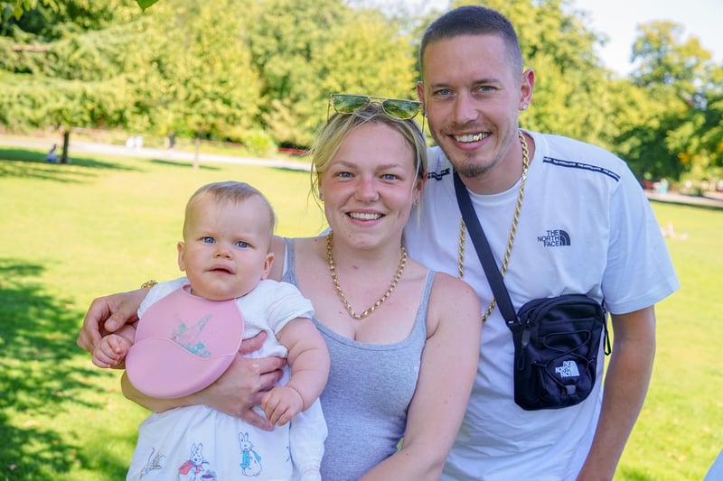 Becky and Kyle with Ky-Rae enjoy the sunshine in Queens Park, Chesterfield.