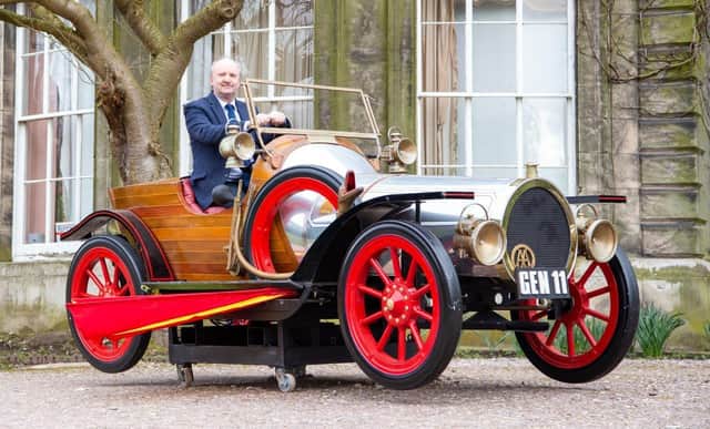 Steve Fulford, toy valuer at Hansons, in the Chitty Chitty Bang Bang car.
