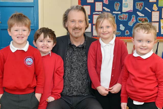 Headteacher Cliff Hadley is retiring after a long career at schools across Chesterfield. Pictured with pupils Harry, Indie, Perry and Ruben at Henry Bradley School in Brimington.