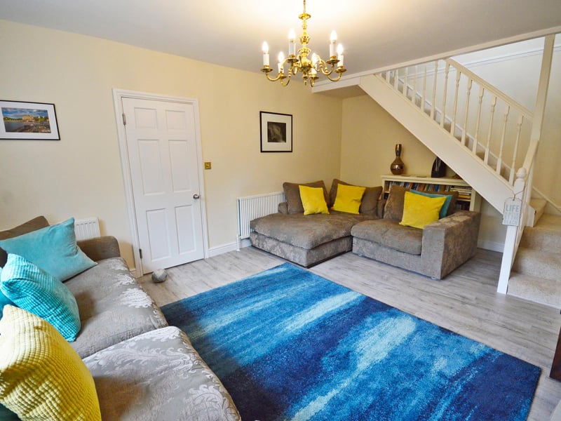 Stairs from the living room lead up to the landing.
