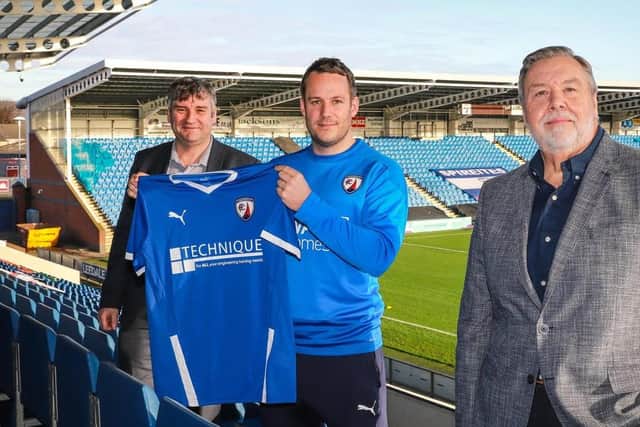 Chief executive John Croot and chairman Mike Goodwin either side of James Rowe after appointing him as manager in November 2020. Picture: Michael South.