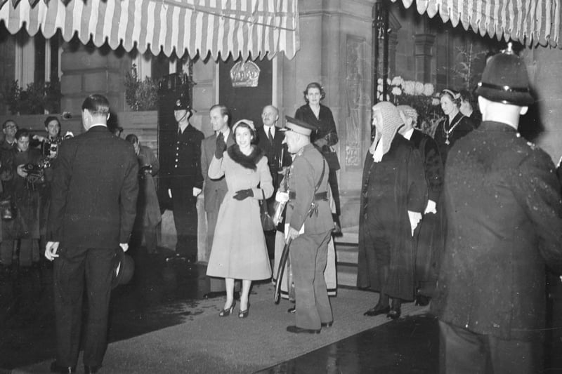 It's 1954 and Queen Elizabeth II still manages a radiant smile after a tiring day of public engagements. Here she is outside Sunderland Town Hall.