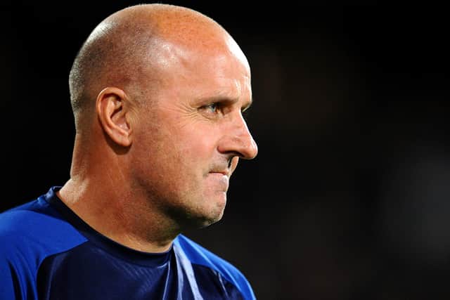 Paul Cook is set to leave Wigan Athletic.