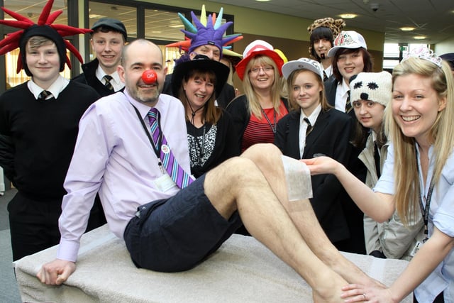 Jonathan Nadin Head of IT at Springwell Community School has his legs waxed for Comic Relief by Jen Marsh Drama Coordinator in 2011