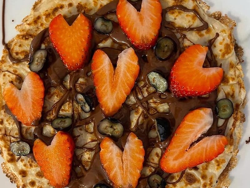 Our featured photo, courtesy of Sophier Goff-Wills and her delicious strawberry and chocolate pancake!