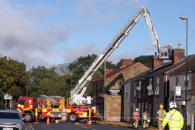 Firefighers at the scene of the blaze on Newbold Road on Monday, September 27