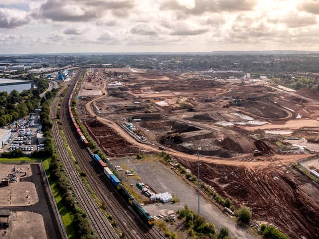 An aerial panoramic view of the new HS2 route and construction site running alongside current railway tracks near Washwood Heath on the outskirts of Birmingham, taken in August 2023.