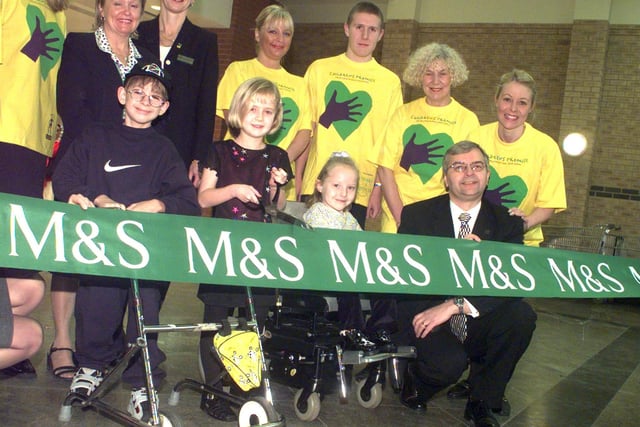 The new look Marks and Spencer, was opened in 1999 by "Children of promise" from left Karl Goddard, Emma Green and Natasha Wilson,with Store Manager Stefan Andrejczuk right